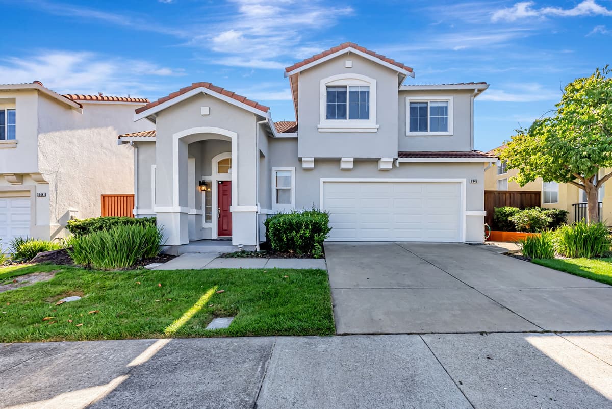 A Bay Vista–managed single-family rental home with a landscaped front yard.
